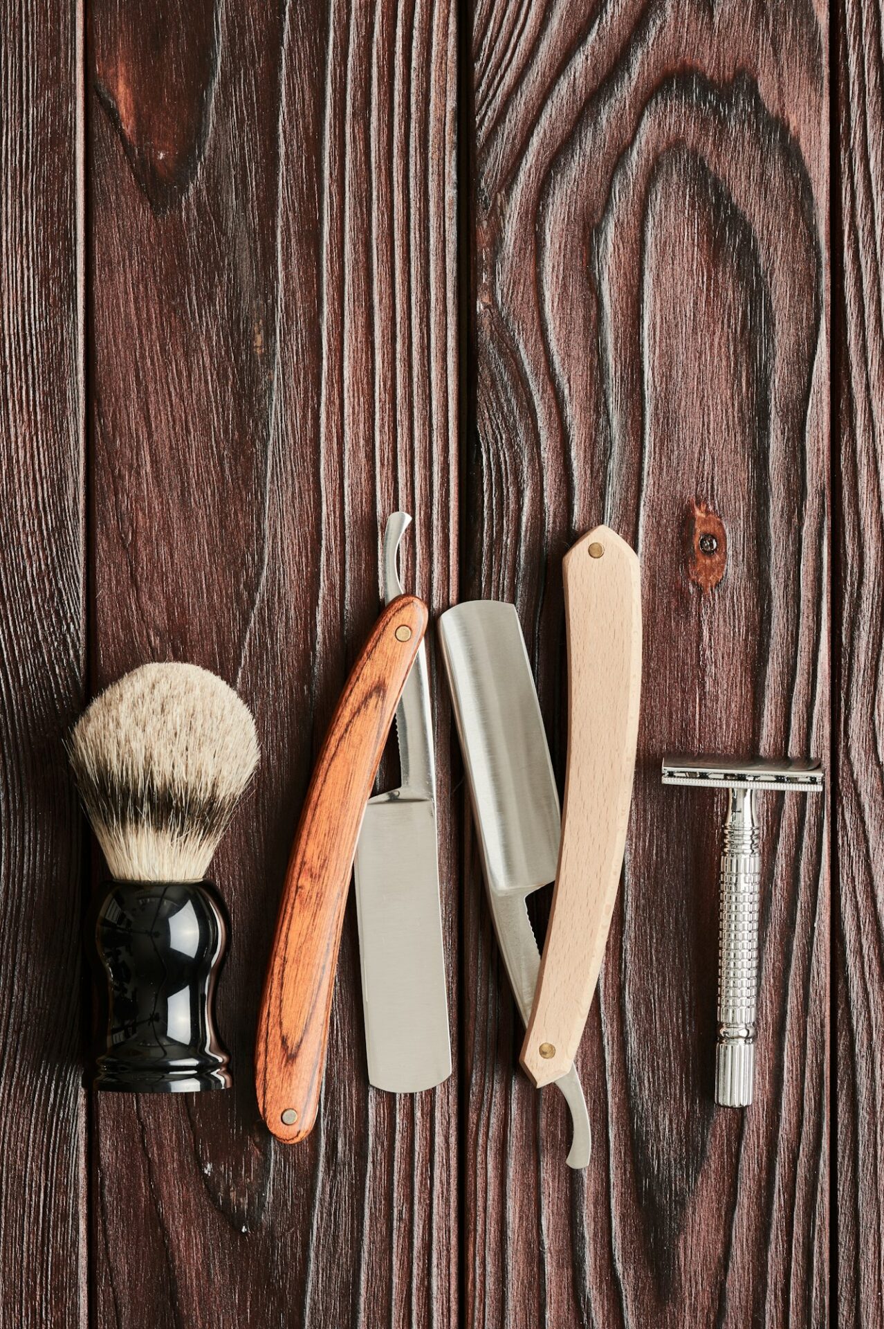 Vintage barber shop tools on wooden background